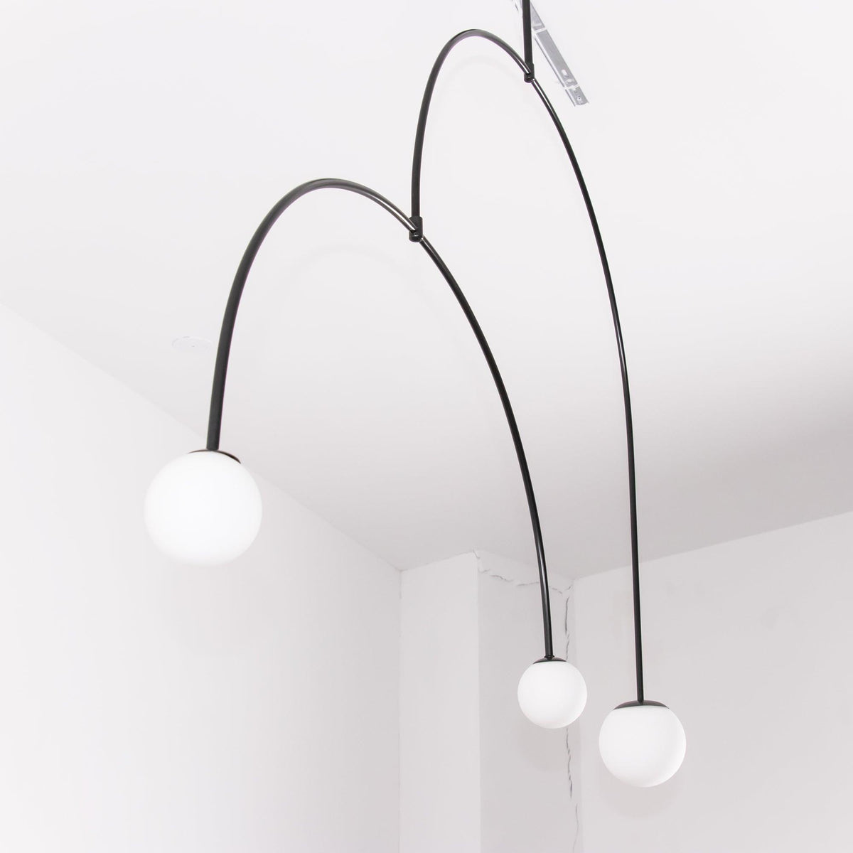 Modern Gold Metal Arc Chandelier – Globe Pendants