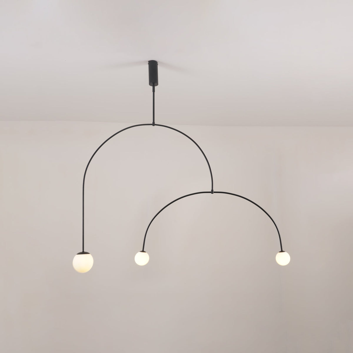 Modern Gold Metal Arc Chandelier – Globe Pendants