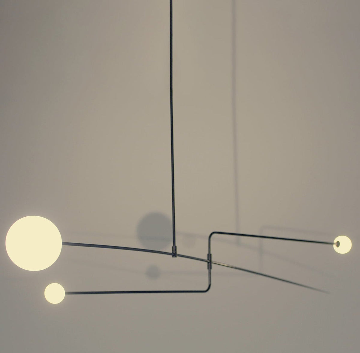 Modern Gold Metal Arc Chandelier – Globe Pendants