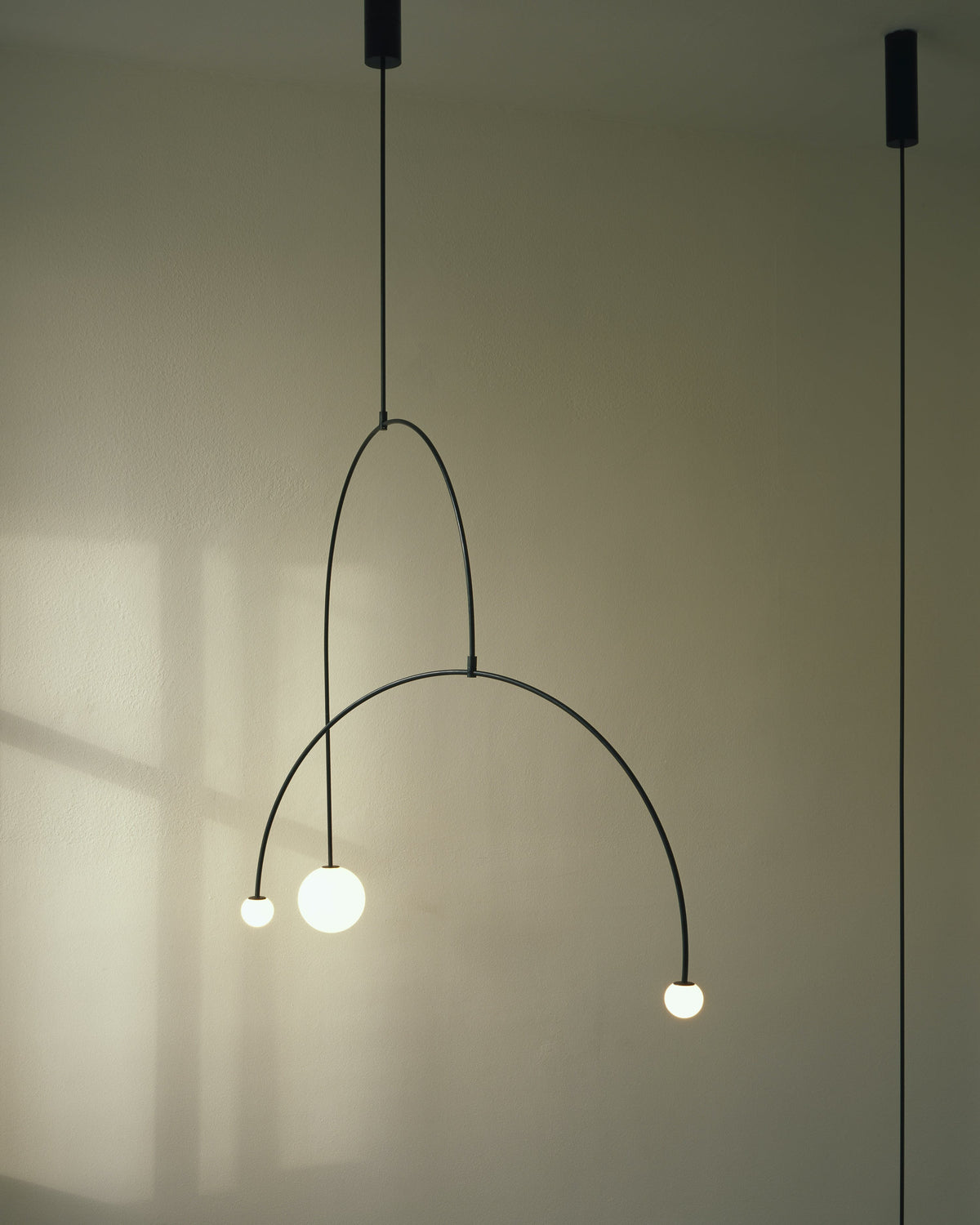 Modern Gold Metal Arc Chandelier – Globe Pendants
