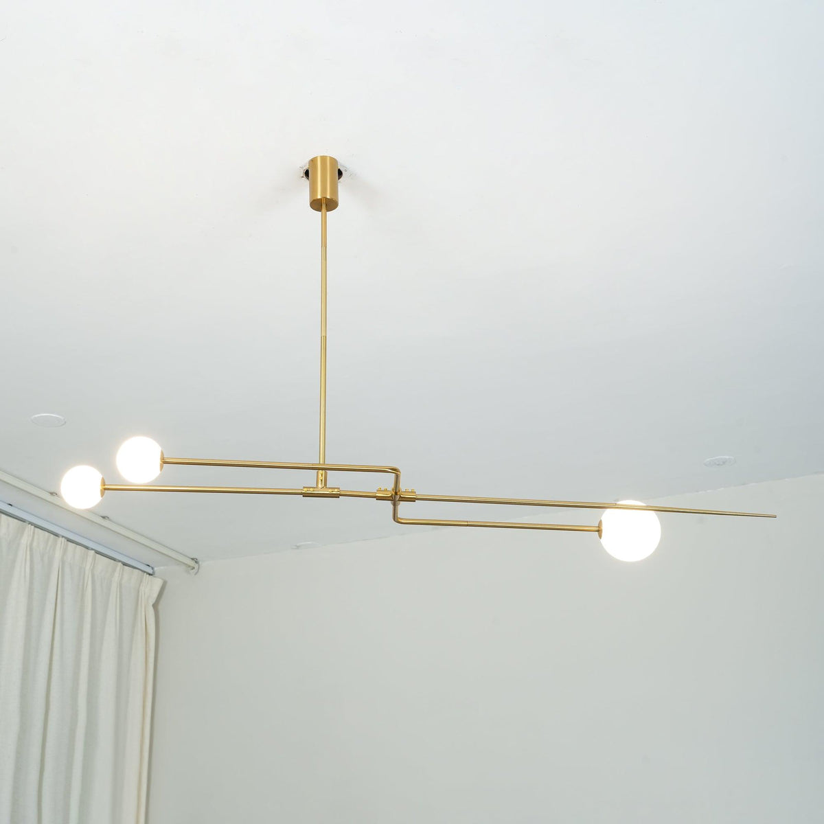 Modern Gold Metal Arc Chandelier – Globe Pendants