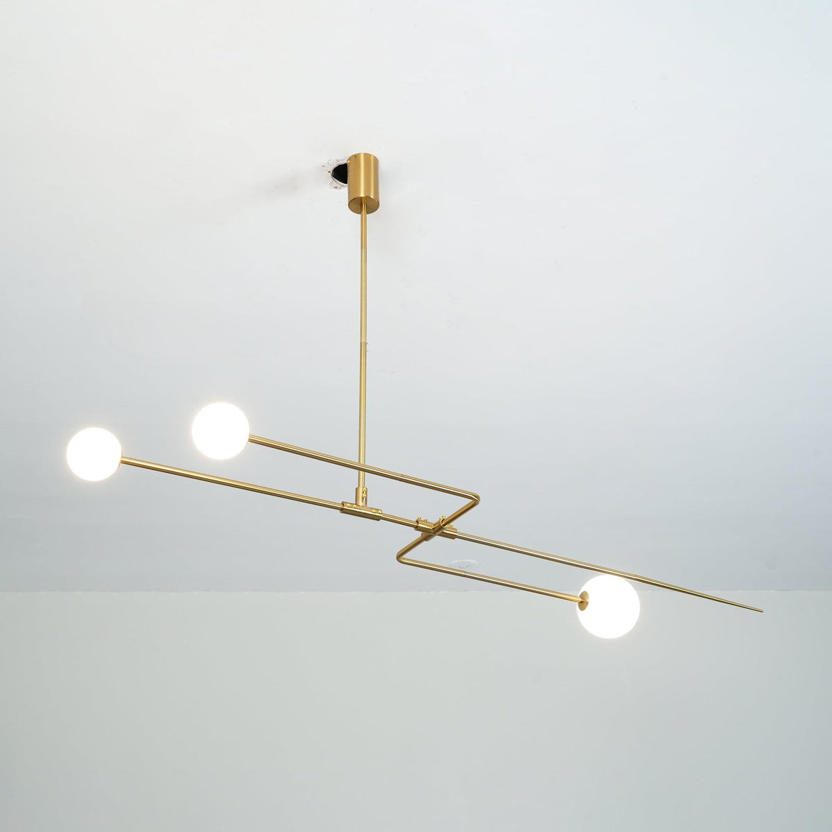 Modern Gold Metal Arc Chandelier – Globe Pendants