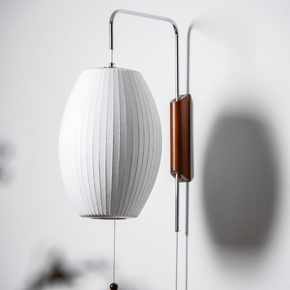 Mid-Century Walnut Bubble Sconce – Swivel Plug-In