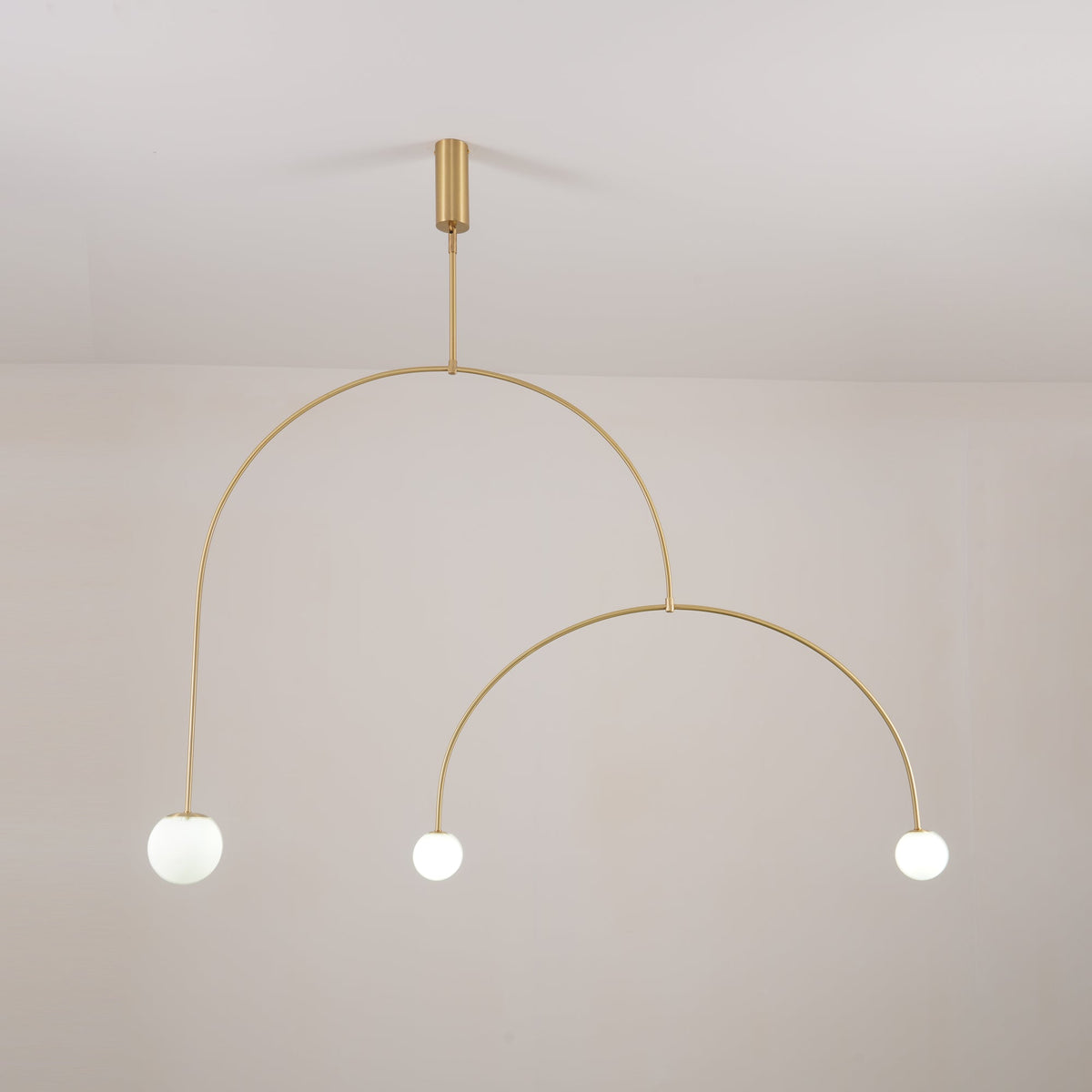 Modern Gold Metal Arc Chandelier – Globe Pendants