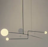 Modern Gold Metal Arc Chandelier – Globe Pendants