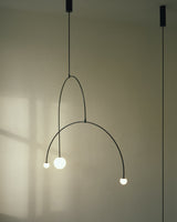 Modern Gold Metal Arc Chandelier – Globe Pendants