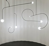 Modern Gold Metal Arc Chandelier – Globe Pendants