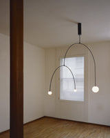 Modern Gold Metal Arc Chandelier – Globe Pendants