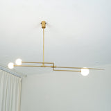 Modern Gold Metal Arc Chandelier – Globe Pendants