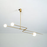 Modern Gold Metal Arc Chandelier – Globe Pendants