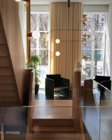 Modern Gold Metal Arc Chandelier – Globe Pendants