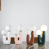 Contemporary Resin Table Lamp – Glass Globe Shade
