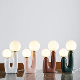 Contemporary Resin Table Lamp – Glass Globe Shade