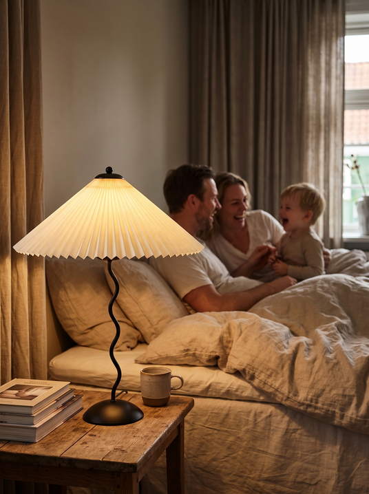 Squiggle wavy table lamp on a bedside table